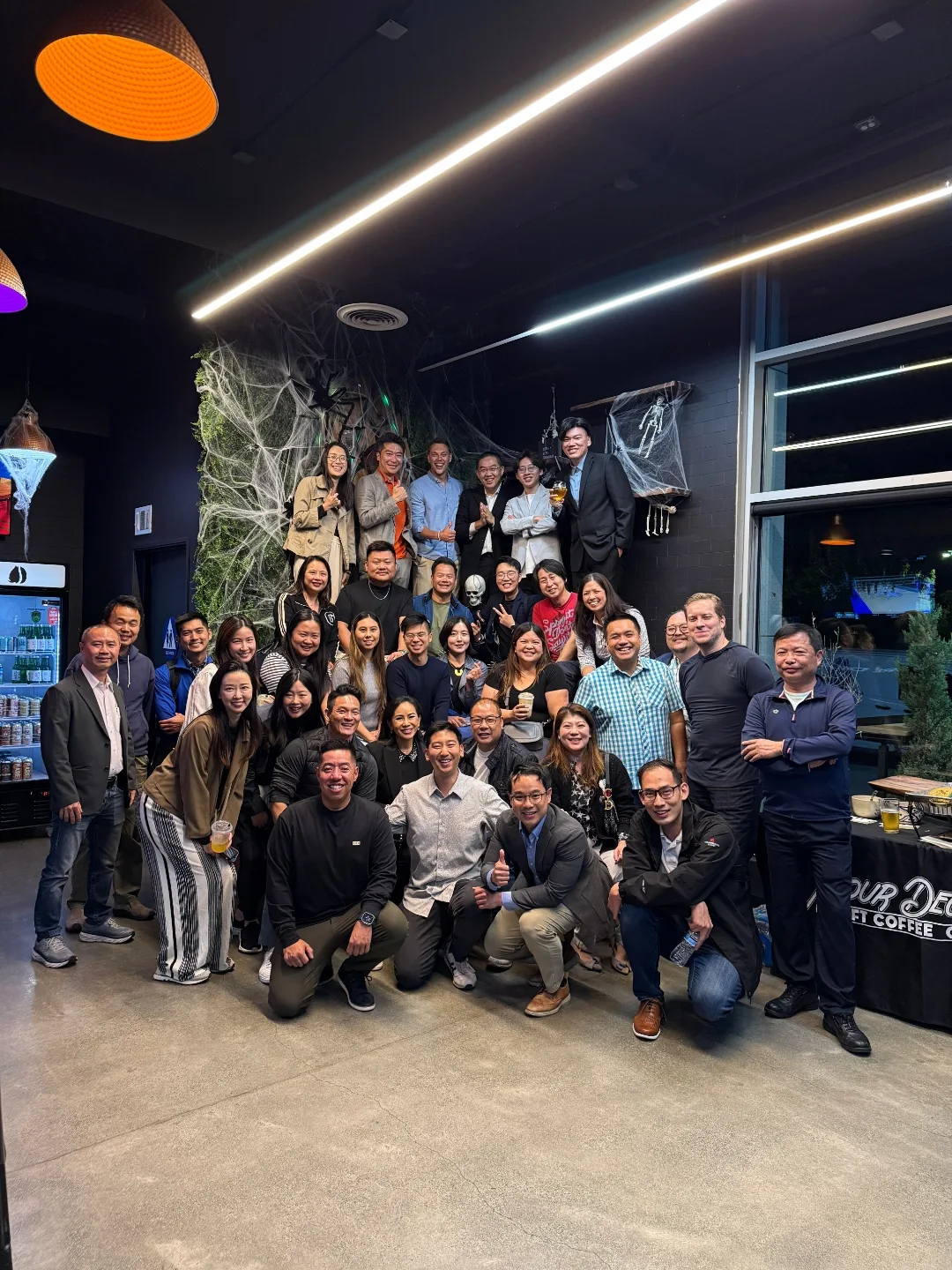 MOM Halloween networking event group photo