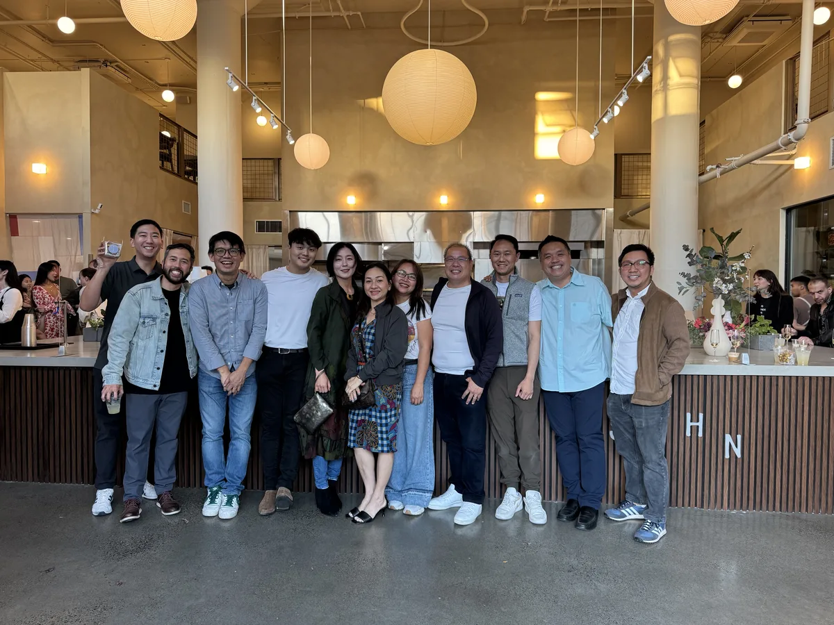 Group photo at modern restaurant